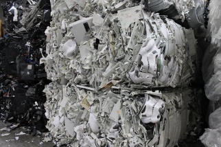 Heavy bales of plastic from electronics are recycled at Balcones Resources in Dallas